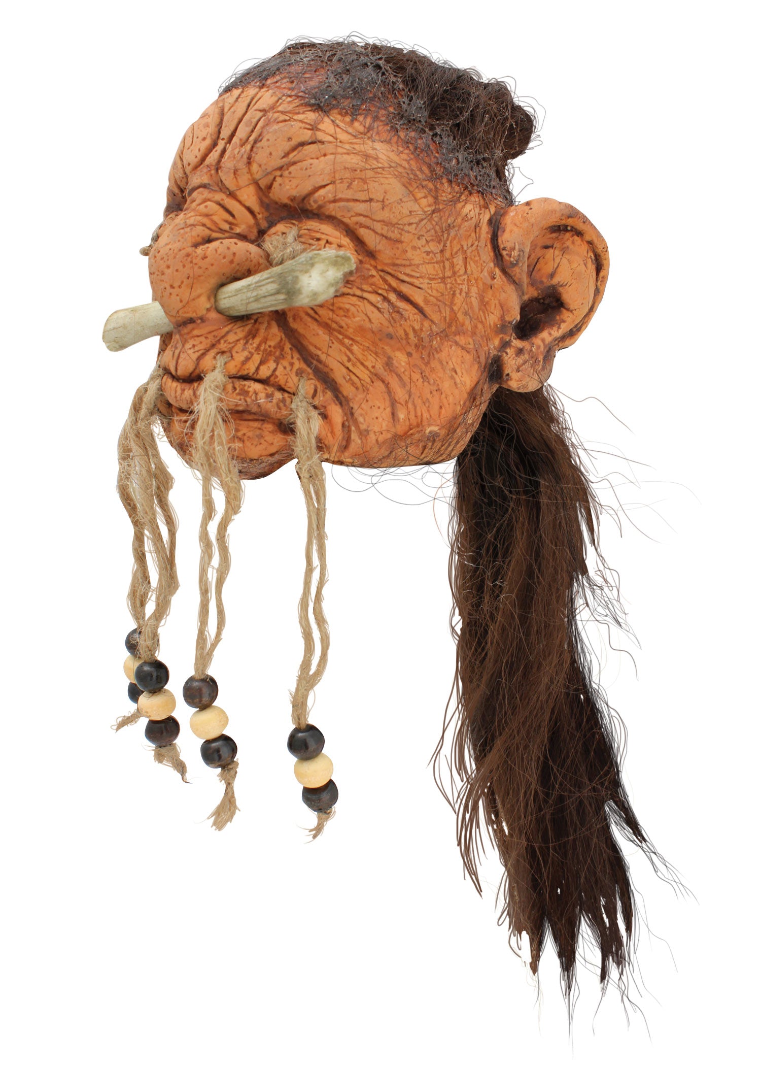 Imagen única de: Cabeza Humana Reducida