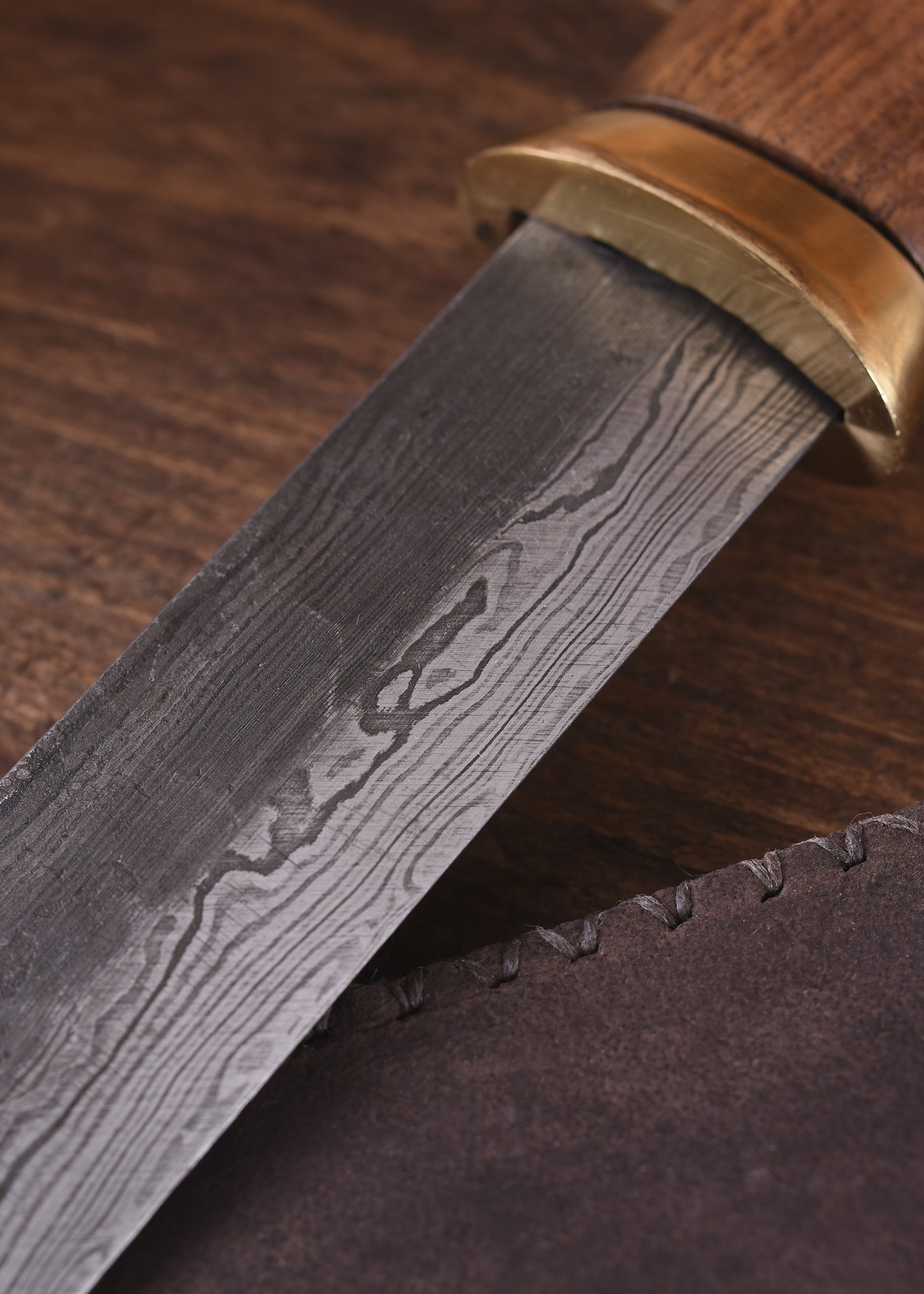 Imagen única de: Sax (Seax) Corto Fabricado En Acero Damasco Con Funda De Cuero Marrón.